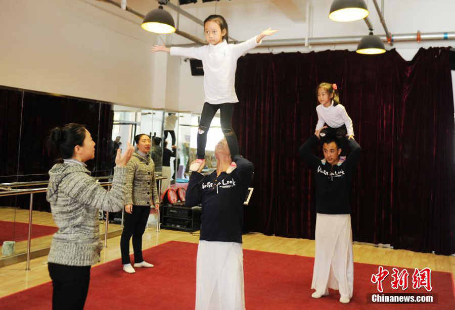 Twin brothers and sisters get married, form acrobatics team