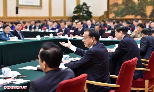 Li pledges dutiful governance to improve residents' well-being