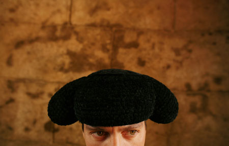 Spanish matador Antonio Barrera looks on while waiting for the start of a bullfight a the Maestranza bull-ring in Seville April 29, 2006. 