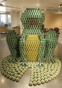 A frog made of cans are seen as part of the 14th annual 'Canstruction' design competition and food drive in New York, Thursday, Nov. 9, 2006. The exhibit, which features 41 objects built from cans, will be open to the public through Nov. 22, 2006. Cities across North America will be sponsoring similar food drives to create more than 600 structures and donate more than two million pounds of food. 