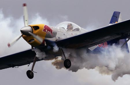 A member of the Patrulle Flying Bulls flies over Samil beach in Vigo, northern Spain, during an aerial exhibition July 22, 2007.