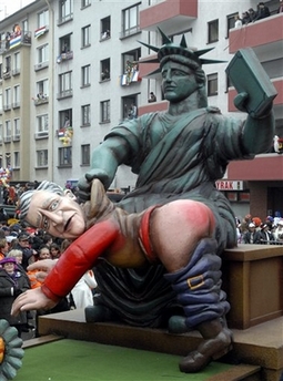 Bush spanked by the Statue Of Liberty 