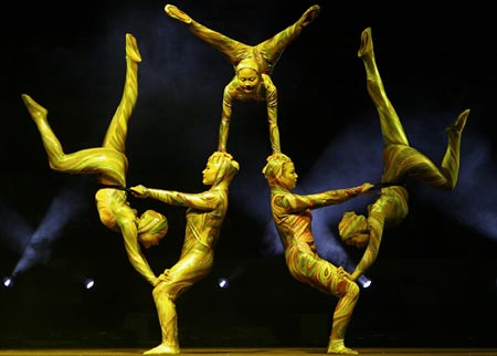 Members of the Zunyi Acrobatic Troupe from the Chinese National Acrobatic Circus perform during a show in Roquetas de Mar, southeast Spain, late August 12, 2007. 