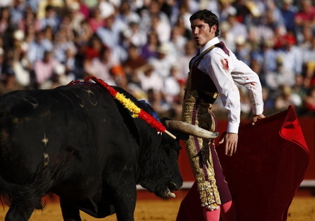 Bullfighters perform in southern Spain