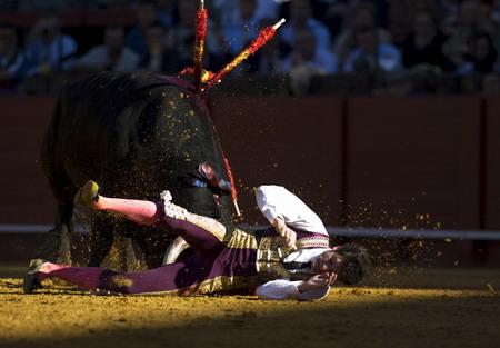 Bullfighters perform in southern Spain