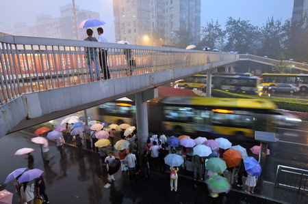 Drizzle blankets Beijing