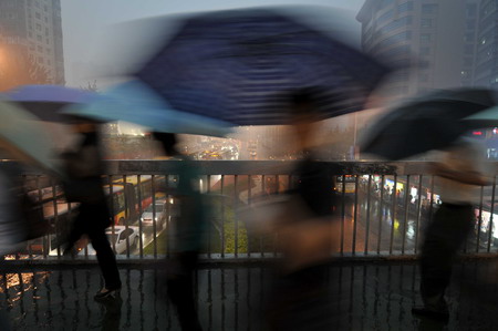 Drizzle blankets Beijing