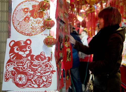 People ready for Spring Festival in Xinjiang