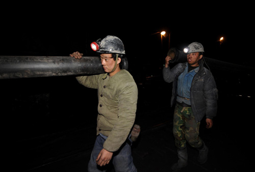 Rescue continues for workers trapped in flooded mine