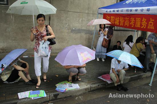 For parents, a long day of waiting, hoping