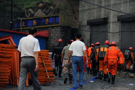 Coal mine flood traps 9, eight confirmed alive