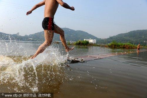 Shaolin monk demonstrates water 'flight'