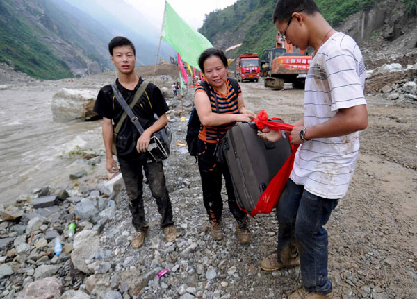 Buried road forces people to climb mountains