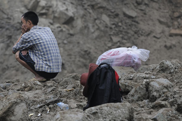 Buried road forces people to climb mountains