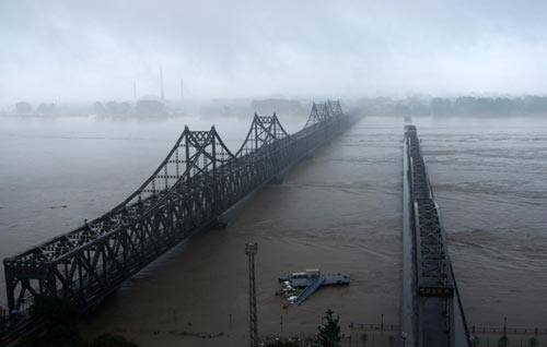 50,000 people evacuated after flood hits NE China