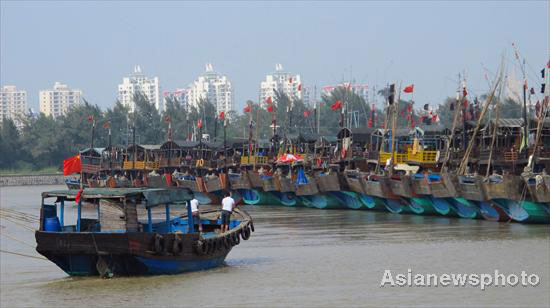 Boats take refuge in port in Haikou