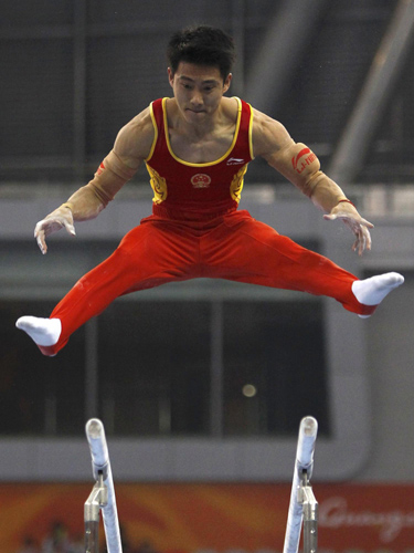 China sweeps 10th Asiad gymnastics men's team gold