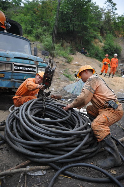 8 trapped in flooded coal mine in SW China