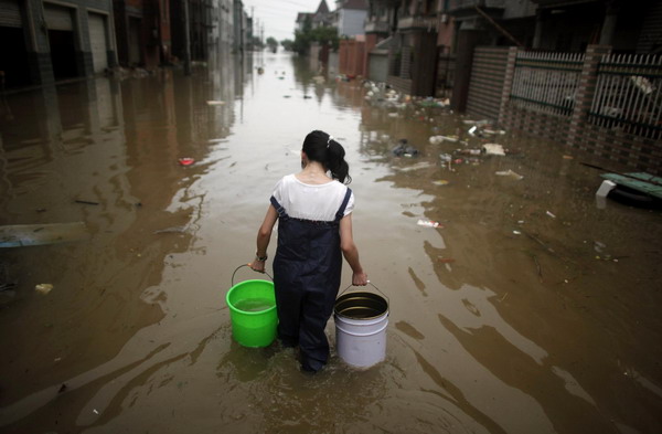 Worst floods in 56 yrs inundate E China village