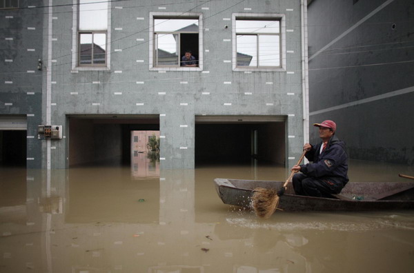 Worst floods in 56 yrs inundate E China village