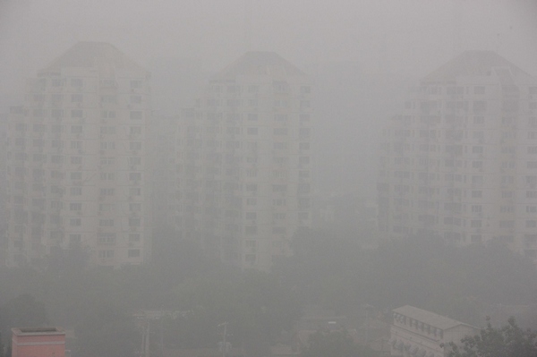 Beijing cloaked in fog