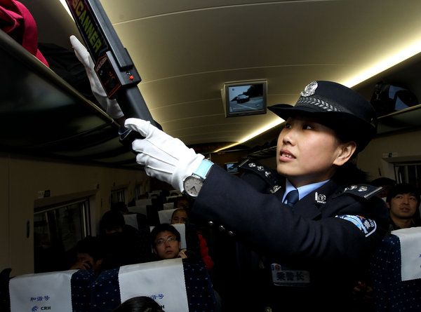 Policewomen serve on high-speed trains