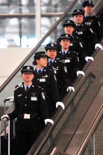 Policewomen serve on high-speed trains