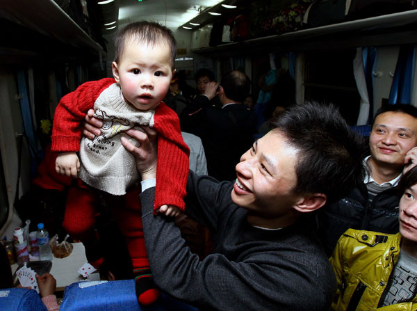 Smiles aboard homeward bound train