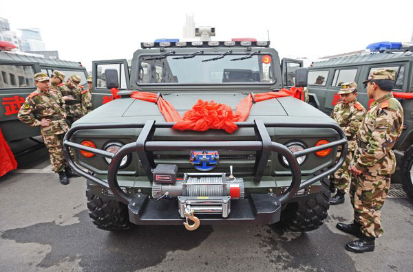 Armed police roll out new China-made trucks