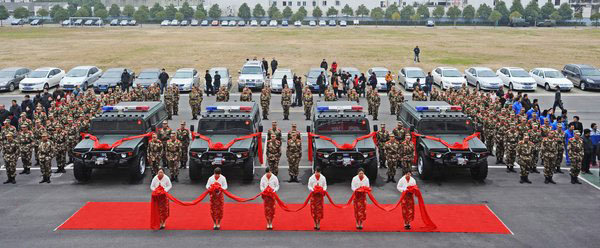 Armed police roll out new China-made trucks