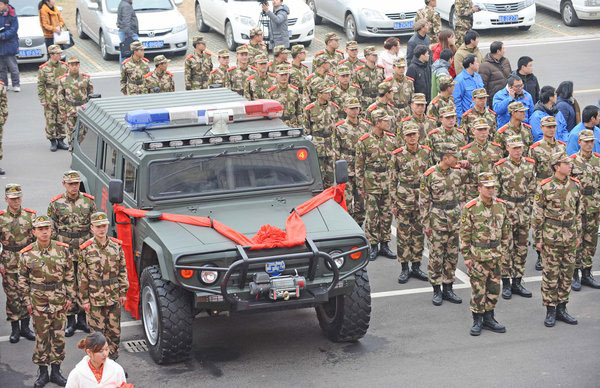 Armed police roll out new China-made trucks