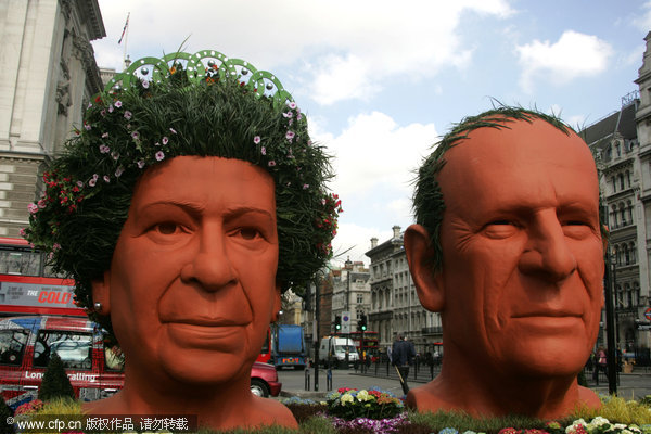 Mock up of the heads of UK's Queen, Prince