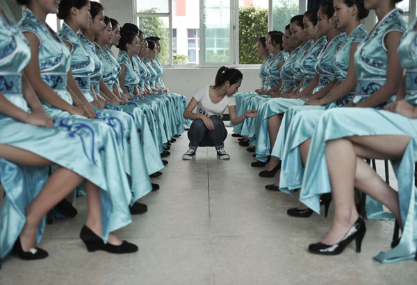 Volunteers perfect postures ahead of fair