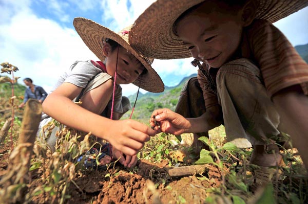 Left behind, children turn to nature