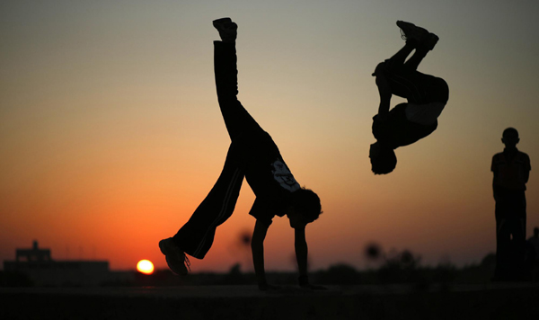 Palestinian youths show parkour skills