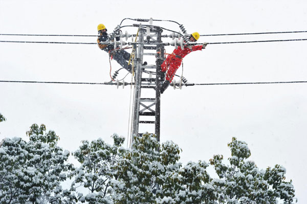 South, East China battle against snow