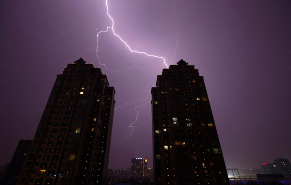 Lightning illuminates the cities