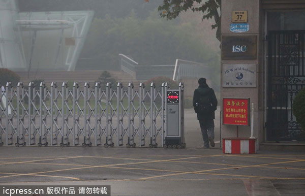 Smoggy E China city suspends classes