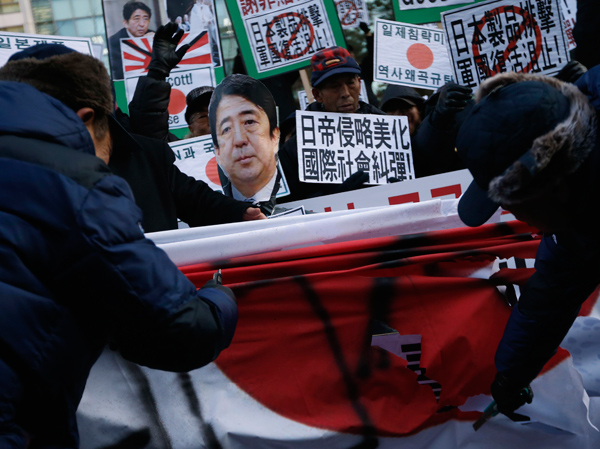 Abe's war shrine visit sparks protest