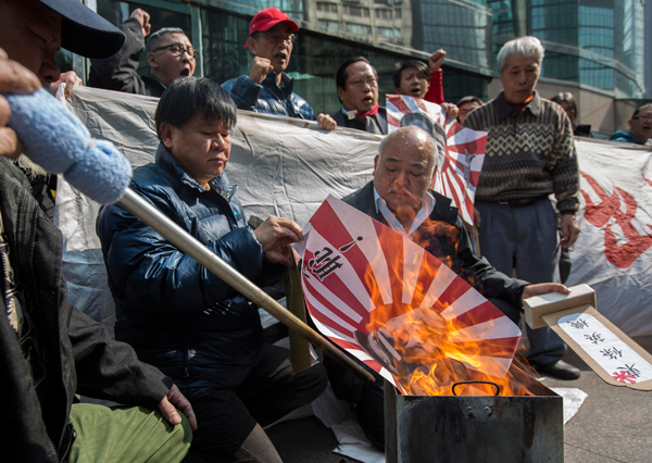 Abe's war shrine visit sparks protest