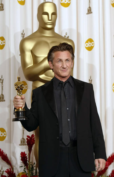 Sean Penn poses with his best actor Oscar at the Academy Awards in Hollywood