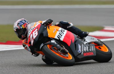 Dani Pedrosa of Spain rides a curve during the qualifying practice session for the 2006 China MotoGP in Shanghai May 13, 2006. The race will be held at the Shanghai International Circuit on Sunday.