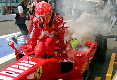 Shumacher's Ferrari catches fire