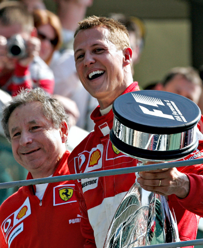 Schumacher wins and announces retirement