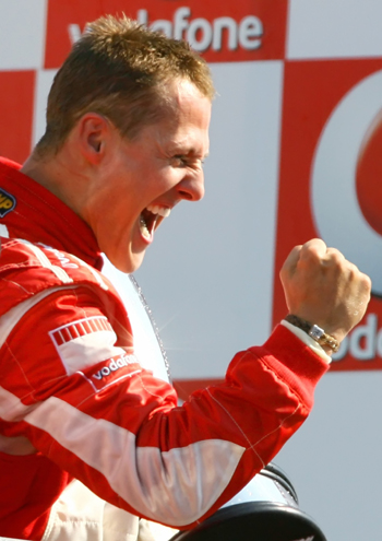 Schumacher wins and announces retirement