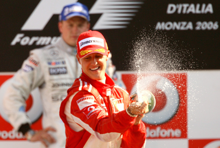 Schumacher wins and announces retirement