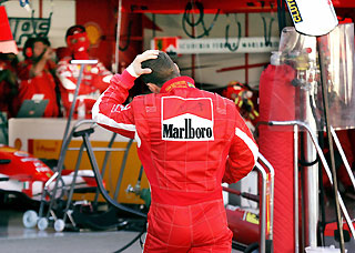 Schumacher concedes title after Alonso triumphs