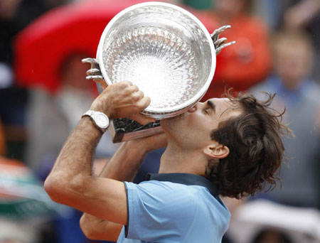 Grand Slam Federer storms to French Open glory