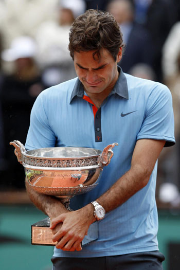 Grand Slam Federer storms to French Open glory