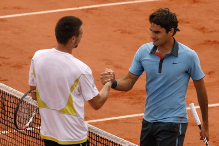 Grand Slam Federer storms to French Open glory